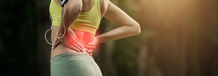 Chiropractic Gilbert AZ Low Back Pain A woman runner with lower back pain.